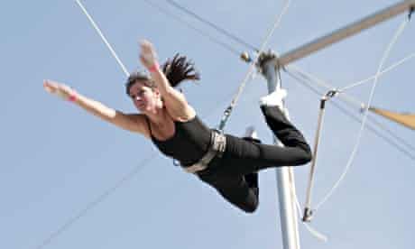 A trapeze student at a class in New York