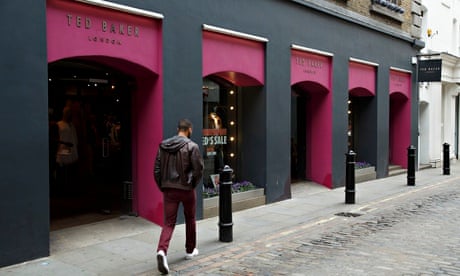 A pedestrian passes the Ted Baker store in Covent Garden, London