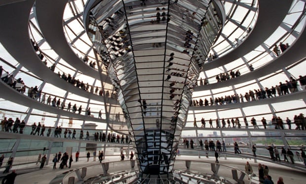 Visitors crowd the glass-dome of the Reichstag-Building in Berlin