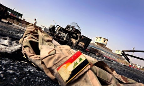 An Iraqi army uniform lies close to the Kukjali checkpoint, some 10km east of Mosul.