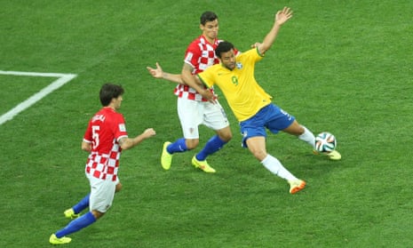 Croatia's Dejan Lovren fouls Brazil's Fred.