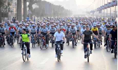 President Abdel Fattah al-Sisi leads a cycle ride in Cairo in a push to cut Egypt's fuel subsidies