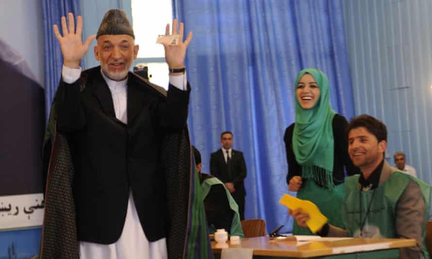 Hamid Karzai casts his vote at a polling station in Kabul in the presidential run-off.