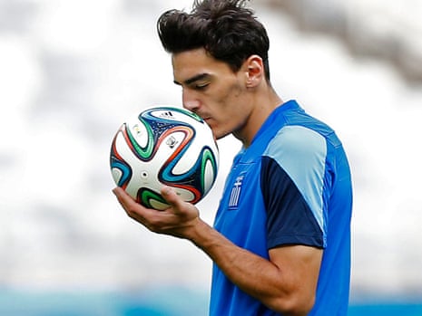 Greece's Lazaros Christodoulopoulos gets up close and personal with a training partner.