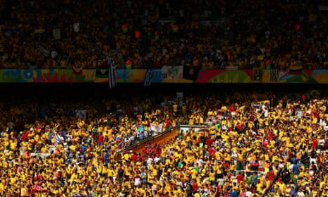 Fans in the sun prior to the start of the match between Colombia and Greece at Estadio Mineirao.