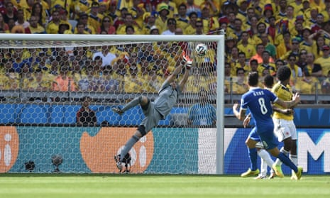 Colombia's goalkeeper David Ospina saves a shot from Greece's midfielder Panagiotis Kone.