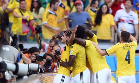 Colombia's midfielder James Rodriguez celebrates after scoring the third.