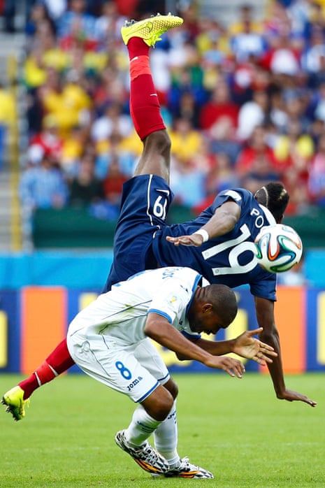 France's Paul Pogba clashes with Wilson Palacios.