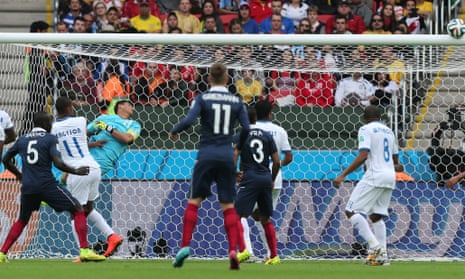 A shot from France's Blaise Matuidi is turned onto the bar by the keeper.