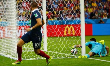 France's Karim Benzema watches as the Honduras keeper fails to keep the ball out.