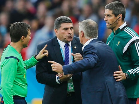 Honduras coach Luis Suarez and France coach Didier Deschamps argue about the second goal.