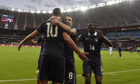 Benzema celebrates with Mathieu Debuchy and Mathieu Valbuena and midfielder Blaise Matuidi.