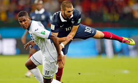 France's Karim Benzema, right, battles with Honduras' Brayan Beckeles in France's 3-0 win.