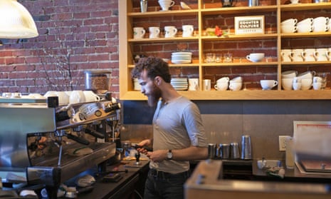A barista in an independent coffee shop