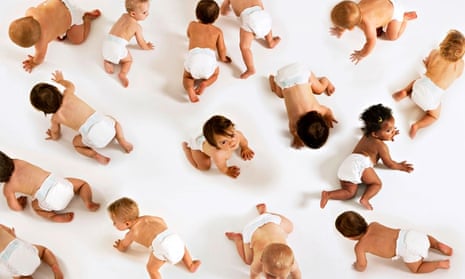 Group of babies in nappies crawling around
