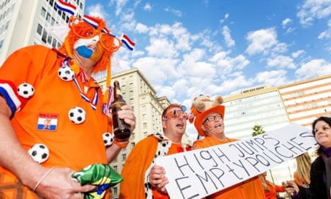 Dutch supporters cheer at the orange square in Porto Alegre.