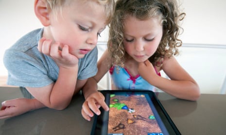 Children playing a tablet game