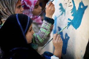 Syrian children at an art class in a Jordan refugee camp