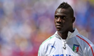 Mario Balotelli of Italy lines up before the match.  If Italy win today, he wants a kiss from the Queen, 'obviously on the cheek.'
