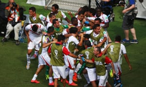 Costa Rica players celebrate after Bryan Ruiz's goal.