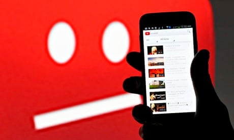 YouTube on a smartphone: the company is accused of playing Goliath to small indie music labels.