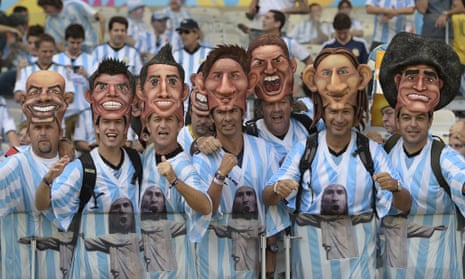 Argentinian fans wear masks of famous Argentine players - can you name them?