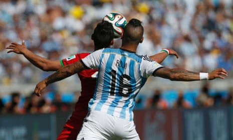 Rojo battles for the ball.  He's been Argentina's  best player so far.
