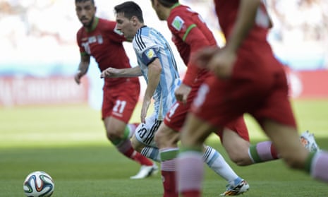 Lionel Messi glides forward with the ball.
