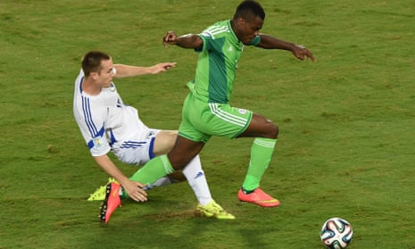 Nigeria striker Emmanuel Emenike skips past the challenge of Bosnia-Hercegovina defender Toni Sunjic.