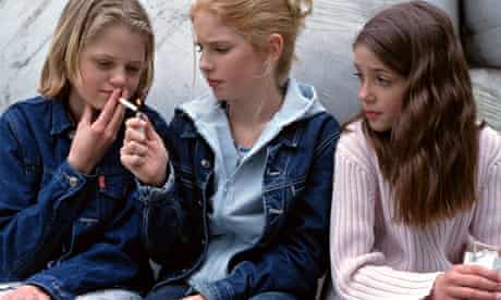 Teenage girls smoking