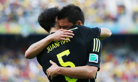 Juanfran and Villa celebrate as Spain take the lead.