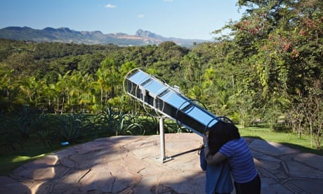 Looking though Olafur Eliasson's kaleidoscopic telescope at Inhotim, Belo Horizonte, Brazil