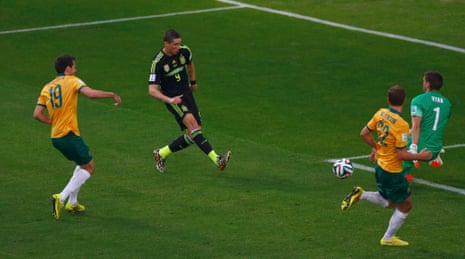Fernando Torres scores a smart goal past Australia's goalkeeper Mathew Ryan.