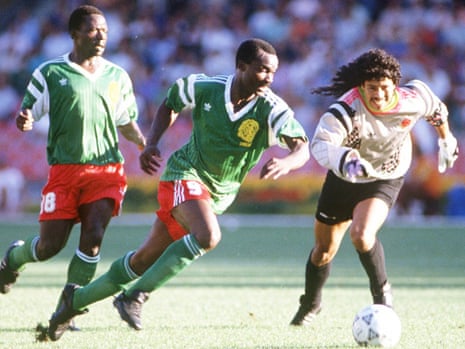 Roger Milla makes a fool of Colombian goalkeeper Rene Higuita back in 1990. Look at the size of that badge. Gorgeous.