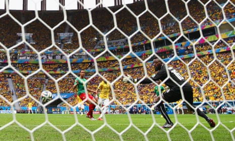 Neymar guides the ball into the back of the net.