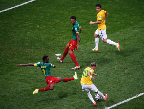 Brazil's Neymar scores his fourth of the tournament.