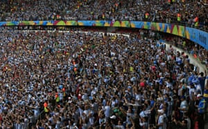 Packed in like sardines, Argentina's supporters cheer for their team at the Beira-Rio Stadium in Porto Alegre as they play Nigeria in the first round of the World Cup.