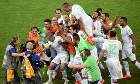 Algeria's players celebrate their qualification.