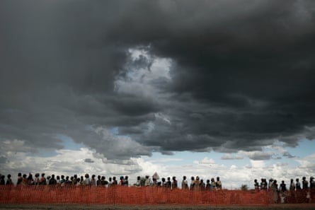 Malakal, Upper Nile State, South Sudan, May 25, 2014: Food distribution with the rain on its way. 