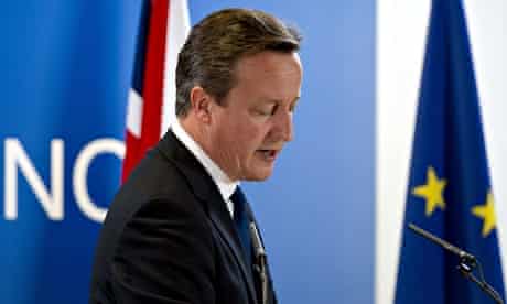 David Cameron holds a press conference at the European Council meeting on 27 June 2014.