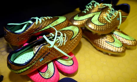 The football boots worn by Neymar of Brazil are displayed in the dressing room prior to Brazil's World Cup match against Chile.