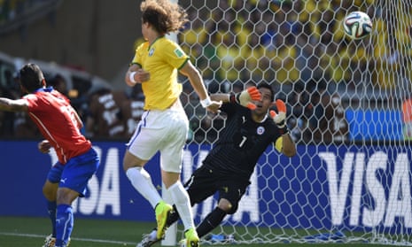 Claudio Bravo can only watch as the ball flies past him and Brazil have the lead.