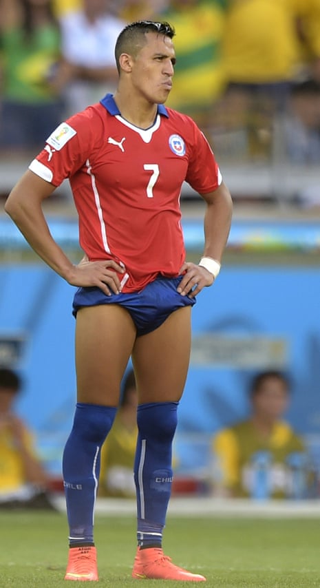 Chile's forward Alexis Sanchez looks on before the beginning of the extra time during the Round of 16 football match between Brazil and Chile in Belo Horizonte.