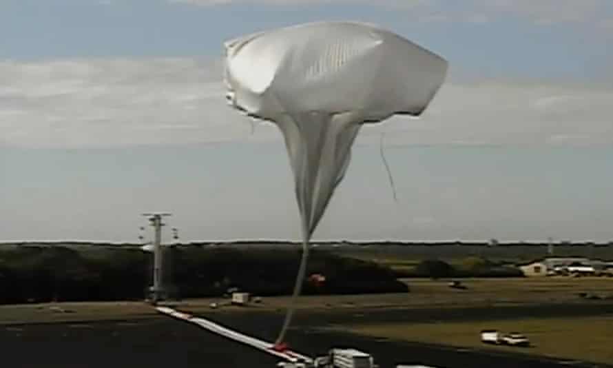 This image provided by NASA shows the launch of the high-altitude balloon carrying a saucer-shaped vehicle for NASA, to test technology that could be used to land on Mars, Saturday June 28, 2014 in Kauai, Hawaii. Saturday's experimental flight high in Earth's atmosphere is testing a giant parachute designed to deliver heavier spacecraft and eventually astronauts. 