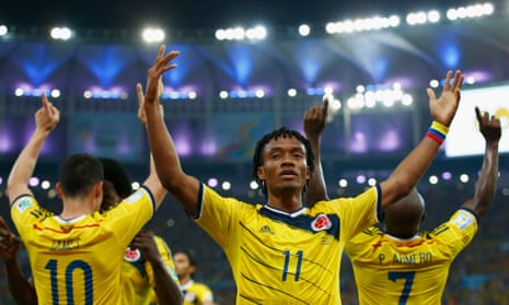 Juan Guillermo Cuadrado celebrates after he set up James Rodriguez's and Colombia's second goal.