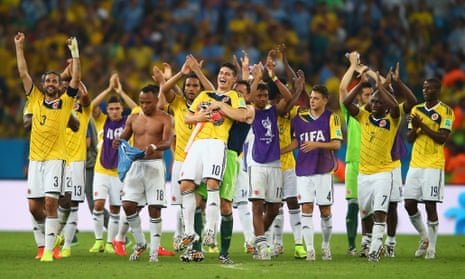 James Rodriguez of Colombia is picked up by goalkeeper David Ospina as the Colombian side celebrate their historic victory.
