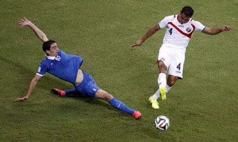 Costa Rica's defender Michael Umana (right) challenges Greece's midfielder Lazaros Christodoulopoulos.