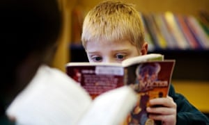 child reading in the library