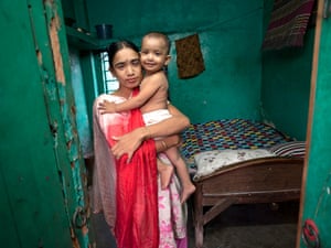 Labone, aged 27, who works at a brothel in Jessore, Bangladesh with her daughter who was fathered by a client. All the money she earns is given to her madam.