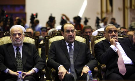 Iraq's Prime Minister Nouri al-Maliki, flanked by former prime minister Ibrahim al-Jaafari, left, and Iraq's Vice President Adel Abdul-Mahdi.